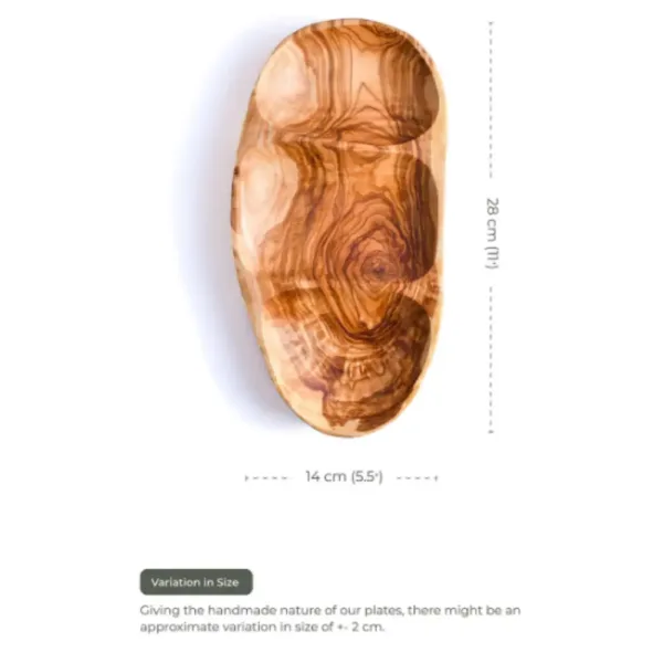 Assiette en bois d’olivier pour servir des amuse-bouches.